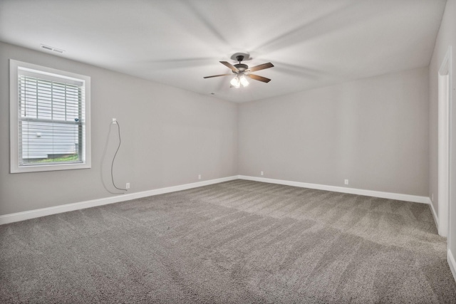 carpeted empty room with ceiling fan