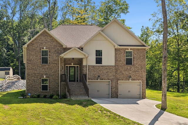 view of front of property featuring a front lawn and a garage