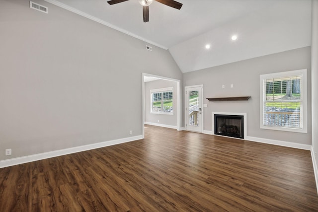 unfurnished living room with ceiling fan, high vaulted ceiling, and dark hardwood / wood-style flooring