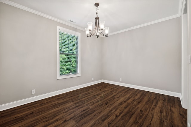 spare room with an inviting chandelier, ornamental molding, and wood-type flooring