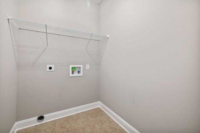 clothes washing area featuring hookup for a washing machine and electric dryer hookup