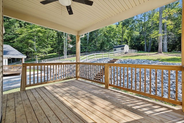 wooden deck with ceiling fan