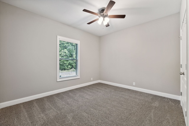 unfurnished room featuring ceiling fan and carpet flooring