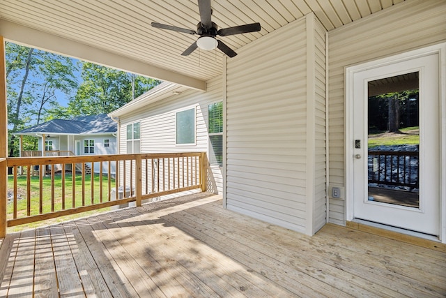 wooden deck with ceiling fan