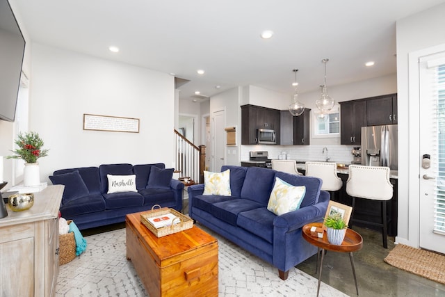 living room featuring sink