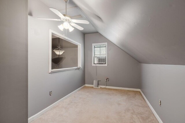 bonus room featuring lofted ceiling, light carpet, ceiling fan, and cooling unit