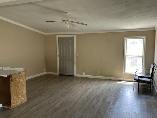 unfurnished living room with ceiling fan and dark hardwood / wood-style flooring