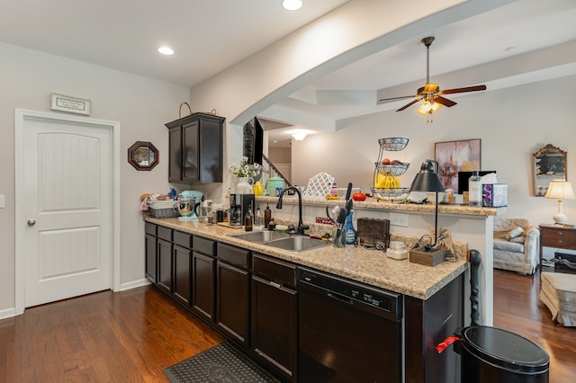 kitchen featuring black dishwasher, sink, kitchen peninsula, dark hardwood / wood-style floors, and ceiling fan