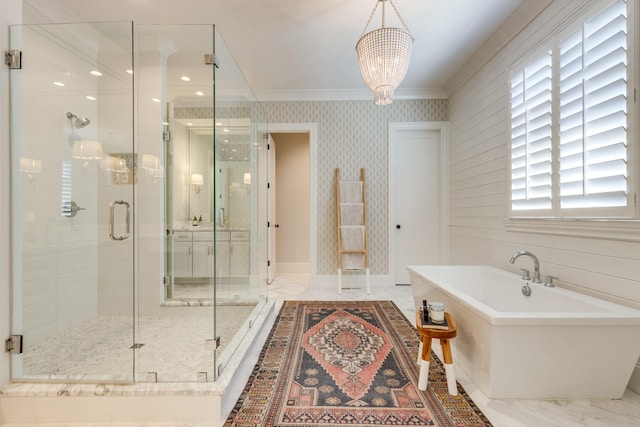 bathroom with ornamental molding, shower with separate bathtub, and a notable chandelier