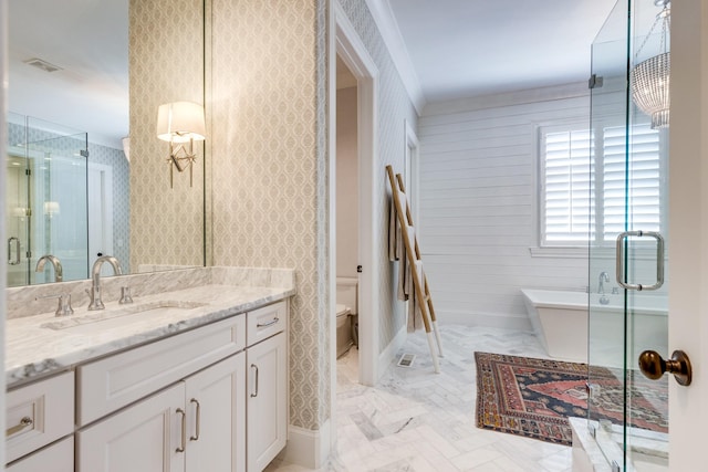 full bathroom with independent shower and bath, vanity, and toilet