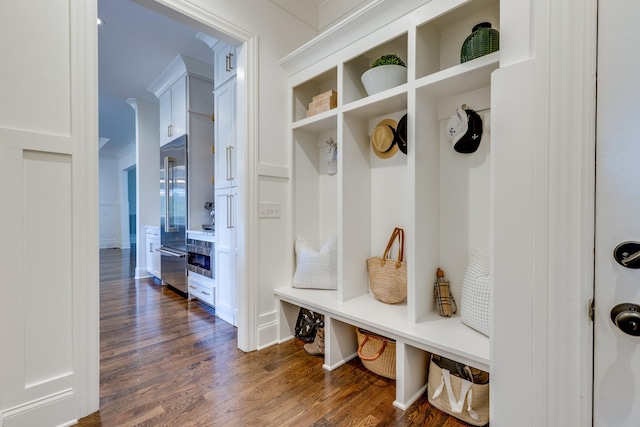 mudroom with dark hardwood / wood-style floors