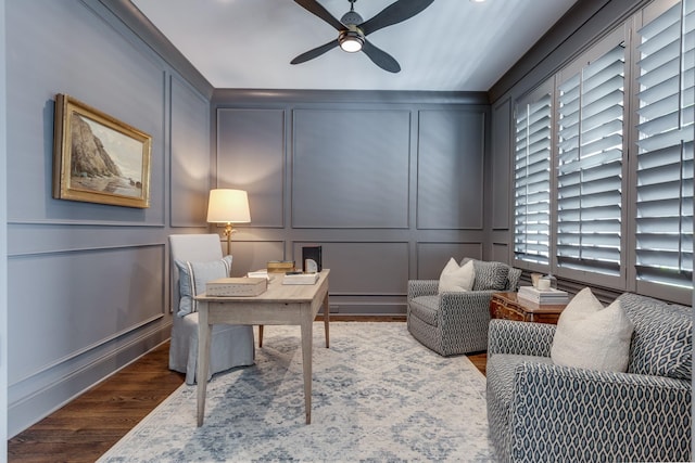 office area with hardwood / wood-style flooring and ceiling fan