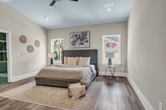 bedroom with wood-type flooring and ceiling fan