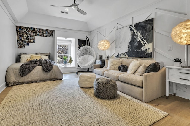 bedroom with ceiling fan and light wood-type flooring