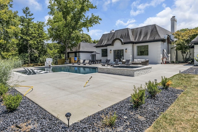 view of swimming pool with a patio and outdoor lounge area