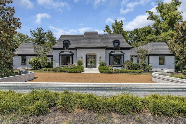 view of french country style house