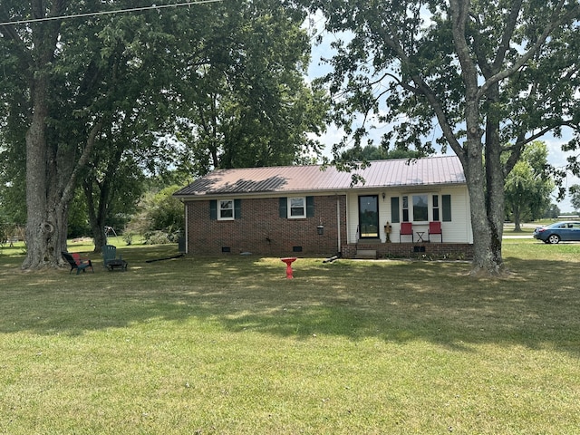 view of front of home with a front lawn