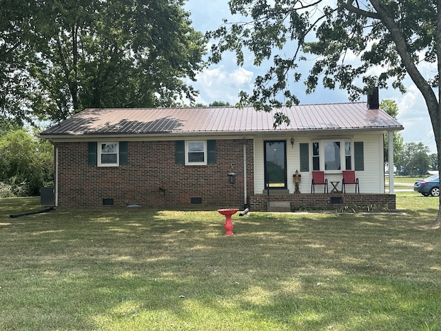 ranch-style home with a front lawn