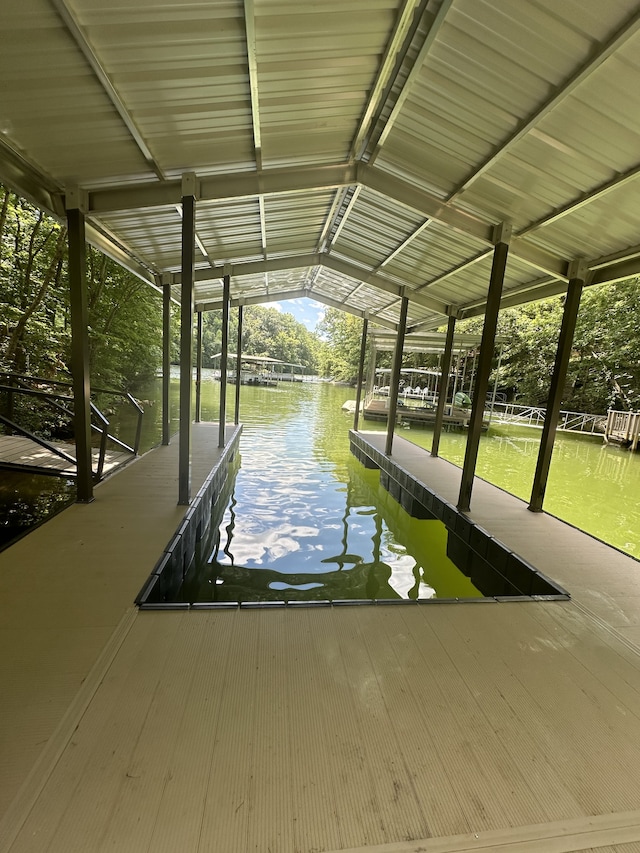 dock area featuring a water view