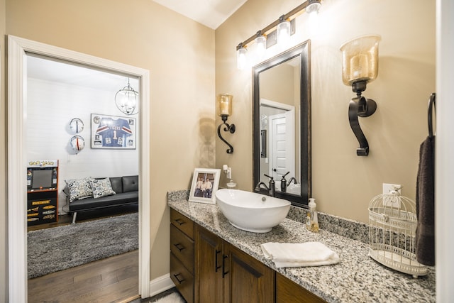 bathroom featuring wood-type flooring and vanity