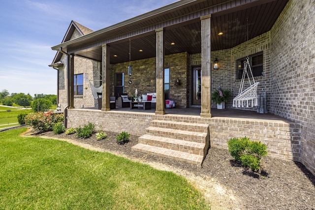 exterior space with a patio, a lawn, and an outdoor hangout area