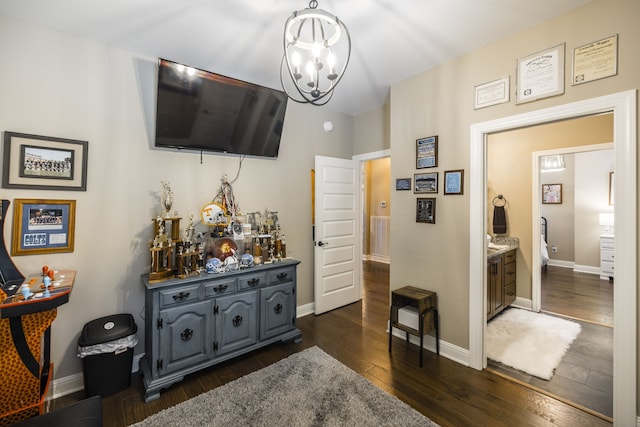 hallway featuring a notable chandelier and dark hardwood / wood-style flooring