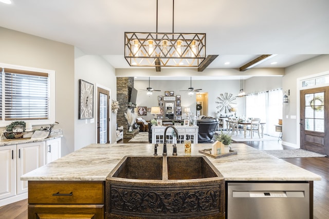 kitchen featuring white cabinets, dishwasher, ceiling fan, and dark wood-type flooring