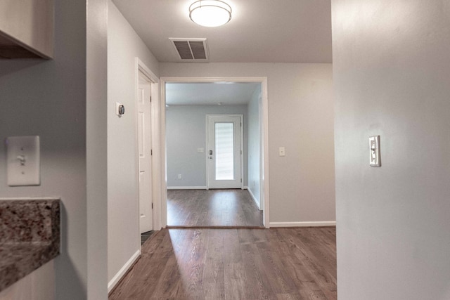 hallway featuring hardwood / wood-style floors