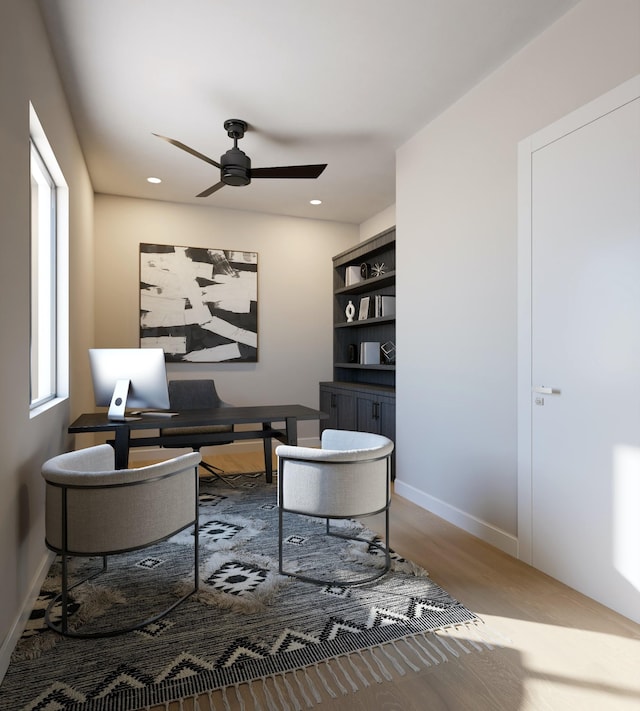 office area with recessed lighting, wood finished floors, baseboards, and ceiling fan