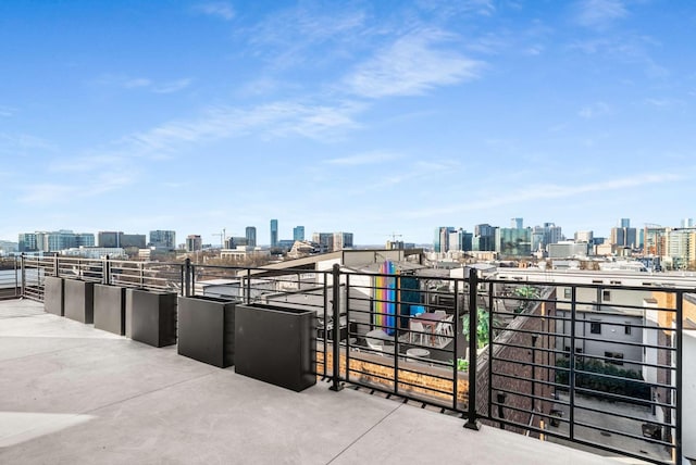 balcony featuring a city view