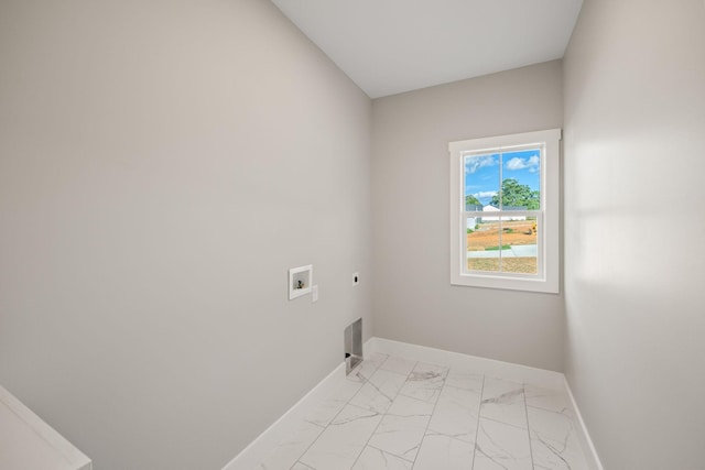 clothes washing area featuring hookup for an electric dryer and washer hookup