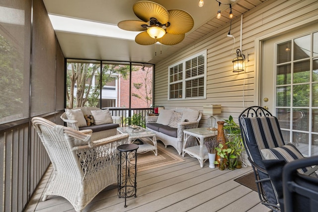 sunroom / solarium with ceiling fan