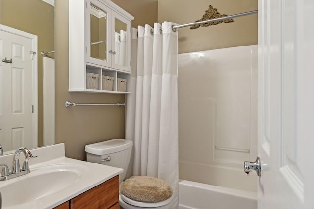 full bathroom with vanity, toilet, and shower / tub combo