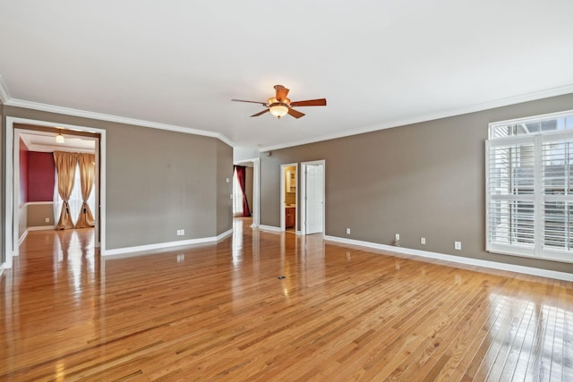 unfurnished room with ornamental molding, ceiling fan, and light hardwood / wood-style floors