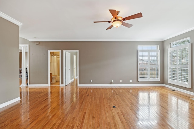 unfurnished room with ceiling fan, ornamental molding, and light hardwood / wood-style flooring