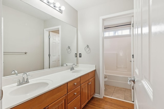 full bathroom featuring vanity, tile patterned flooring, shower / tub combination, and toilet