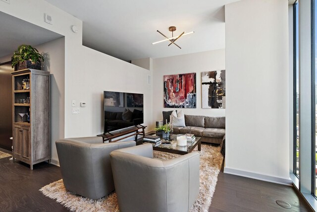 living room featuring dark wood-type flooring