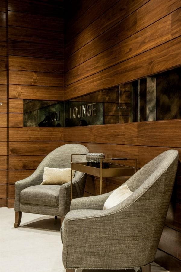 living area featuring wooden walls