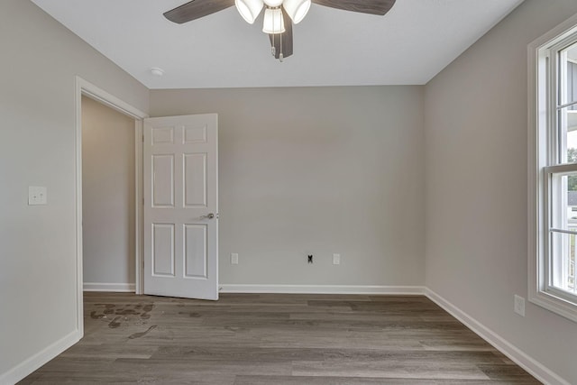 unfurnished room featuring ceiling fan and light hardwood / wood-style floors