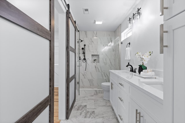 bathroom with tile patterned floors, dual bowl vanity, toilet, and walk in shower