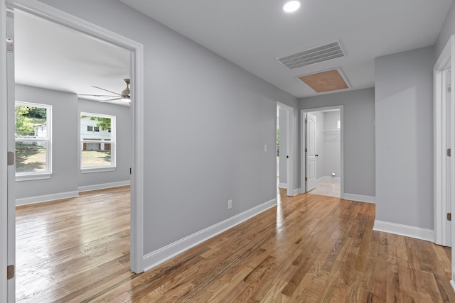 spare room featuring ceiling fan and hardwood / wood-style flooring