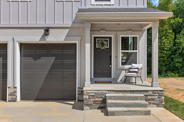 doorway to property featuring a garage