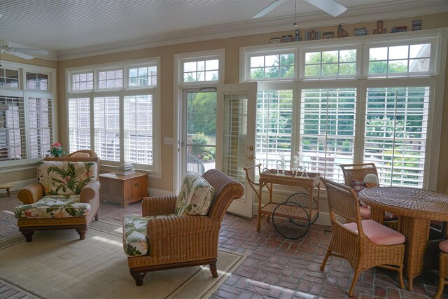 sunroom / solarium with ceiling fan