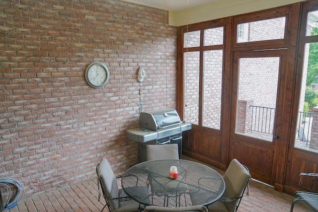 sunroom / solarium with plenty of natural light