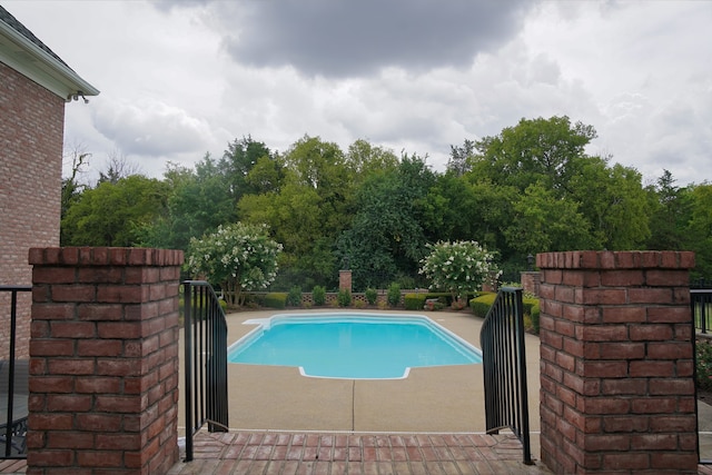 view of pool with a patio area