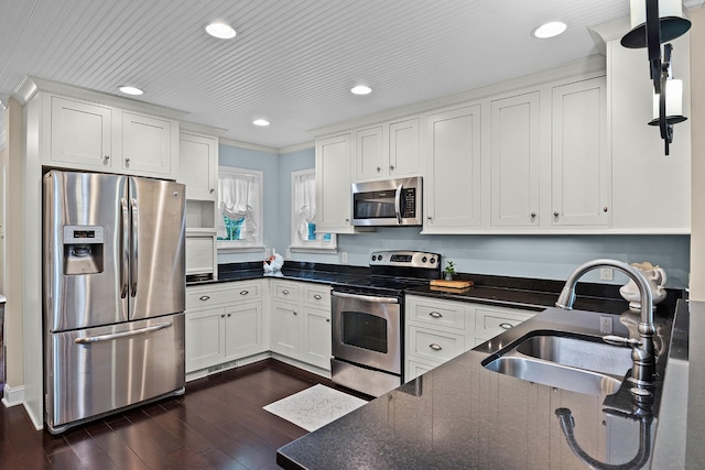 40 Vantage Pt, Counce, TN 38326 - kitchen with stainless steel appliances, a sink, white cabinetry, dark wood-style flooring, and recessed lighting