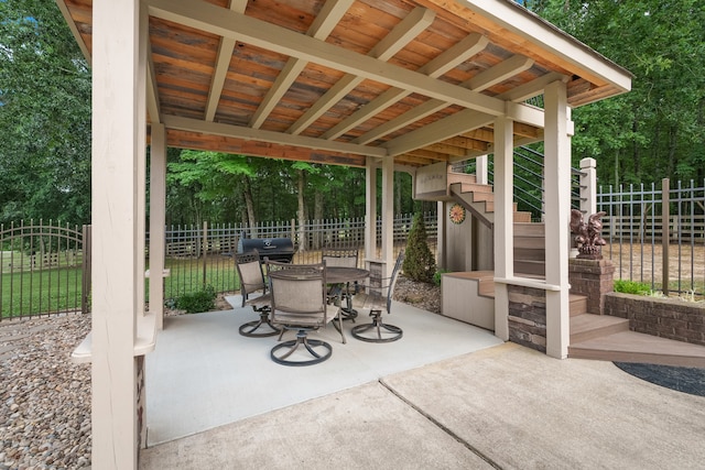 view of patio featuring a grill