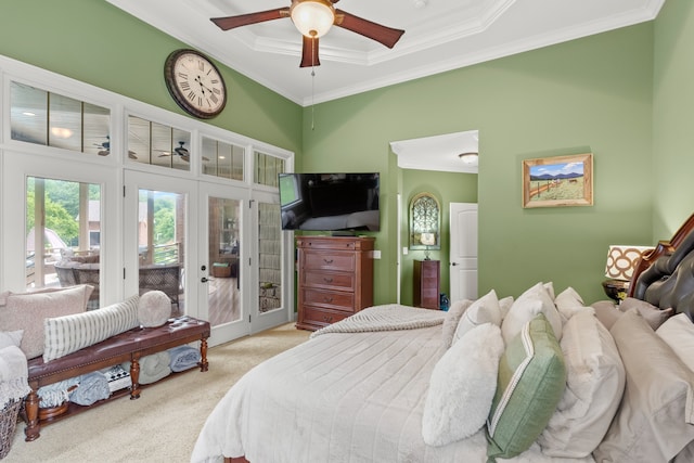 bedroom featuring ceiling fan, crown molding, light carpet, french doors, and access to exterior