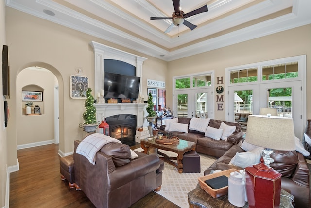 living room with french doors, ceiling fan, and ornamental molding