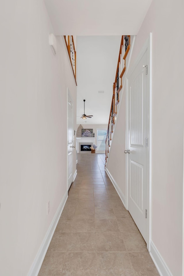 hallway with light tile patterned flooring